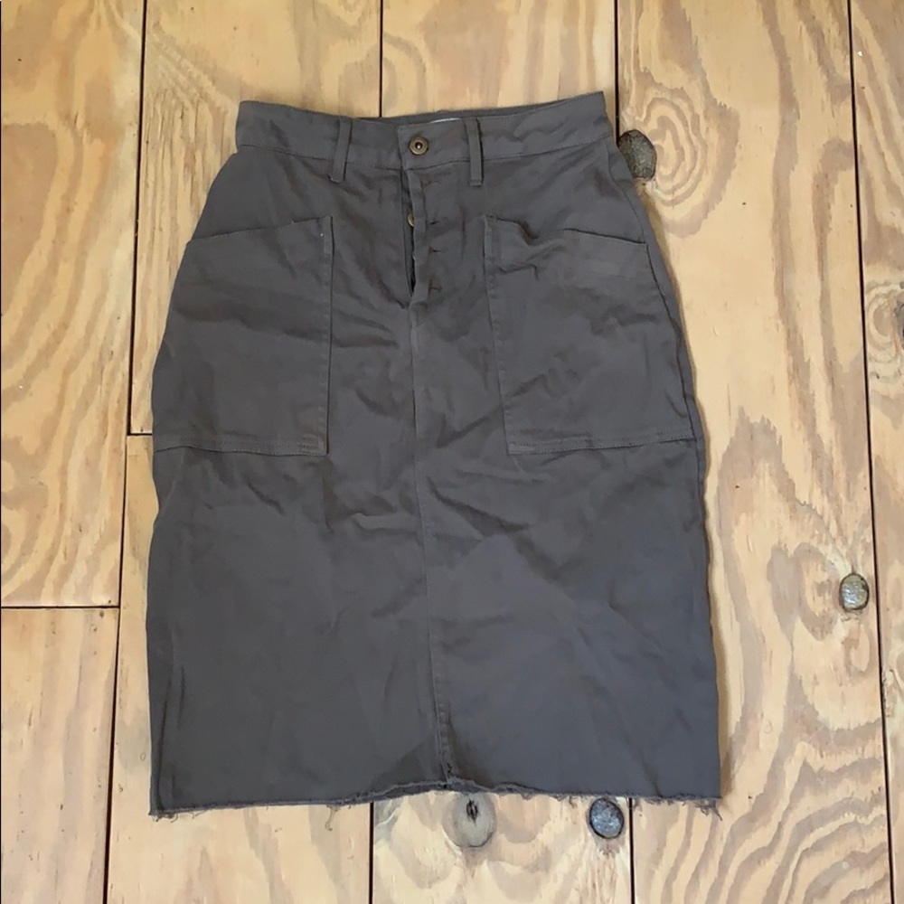 Army green skirt.